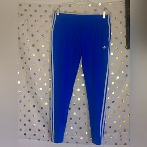 Adidas track pants, drawstring waist, zippered pockets, zippered ankles,